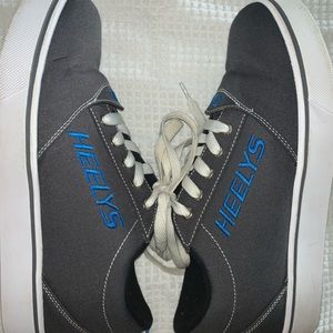 Twice worn Heelys ! Like new; super clean and waiting for some fun.